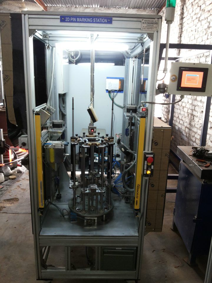 2D pin marking station with safety guarding and HMI, built by N R Engineers